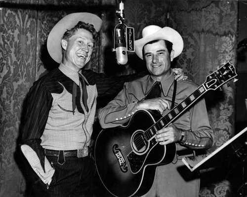 Actor Redd Harper and musician Ray Whitley in the Armed Forces Radio Service studio in Hollywood 02:14:1941